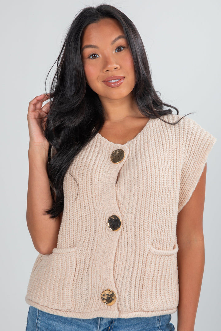 tan sweater